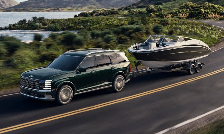 2026 Hyundai Palisade towing a boat